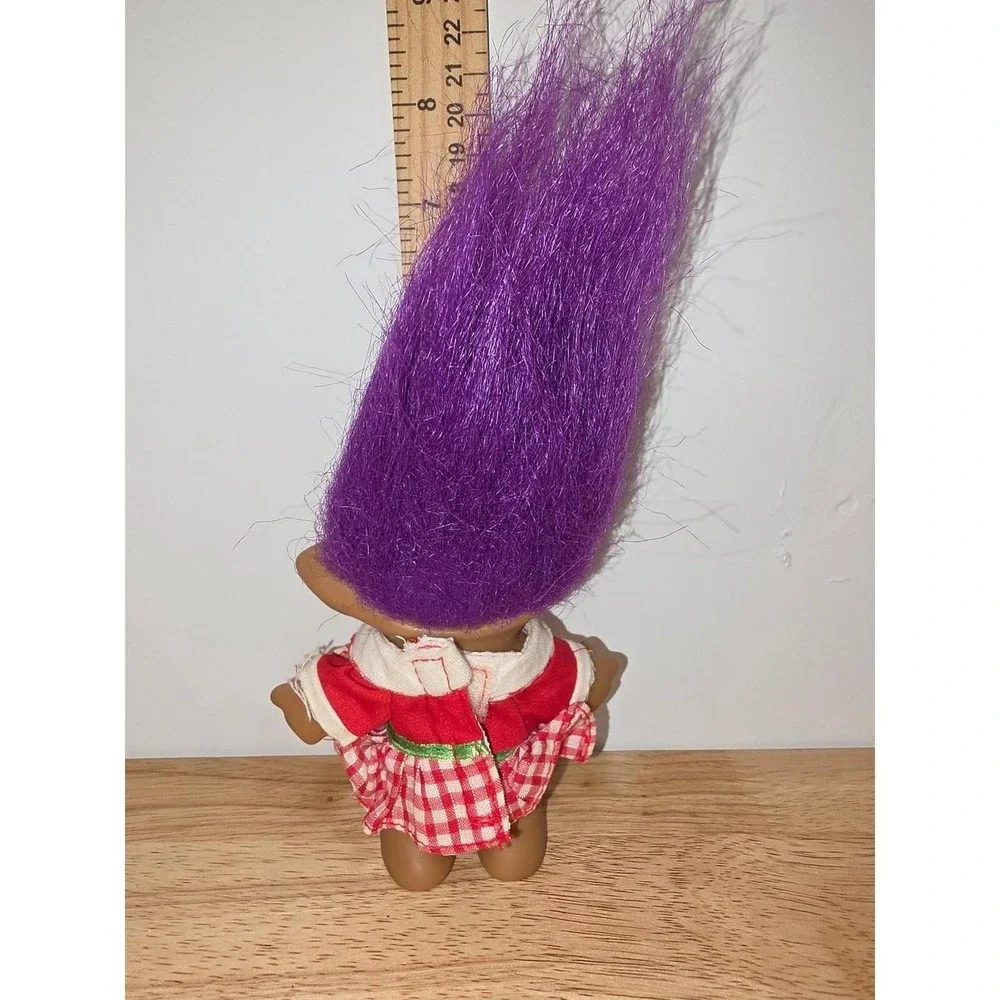 vintage Ace Novelty Treasure Troll doll featuring purple hair, blue eyes